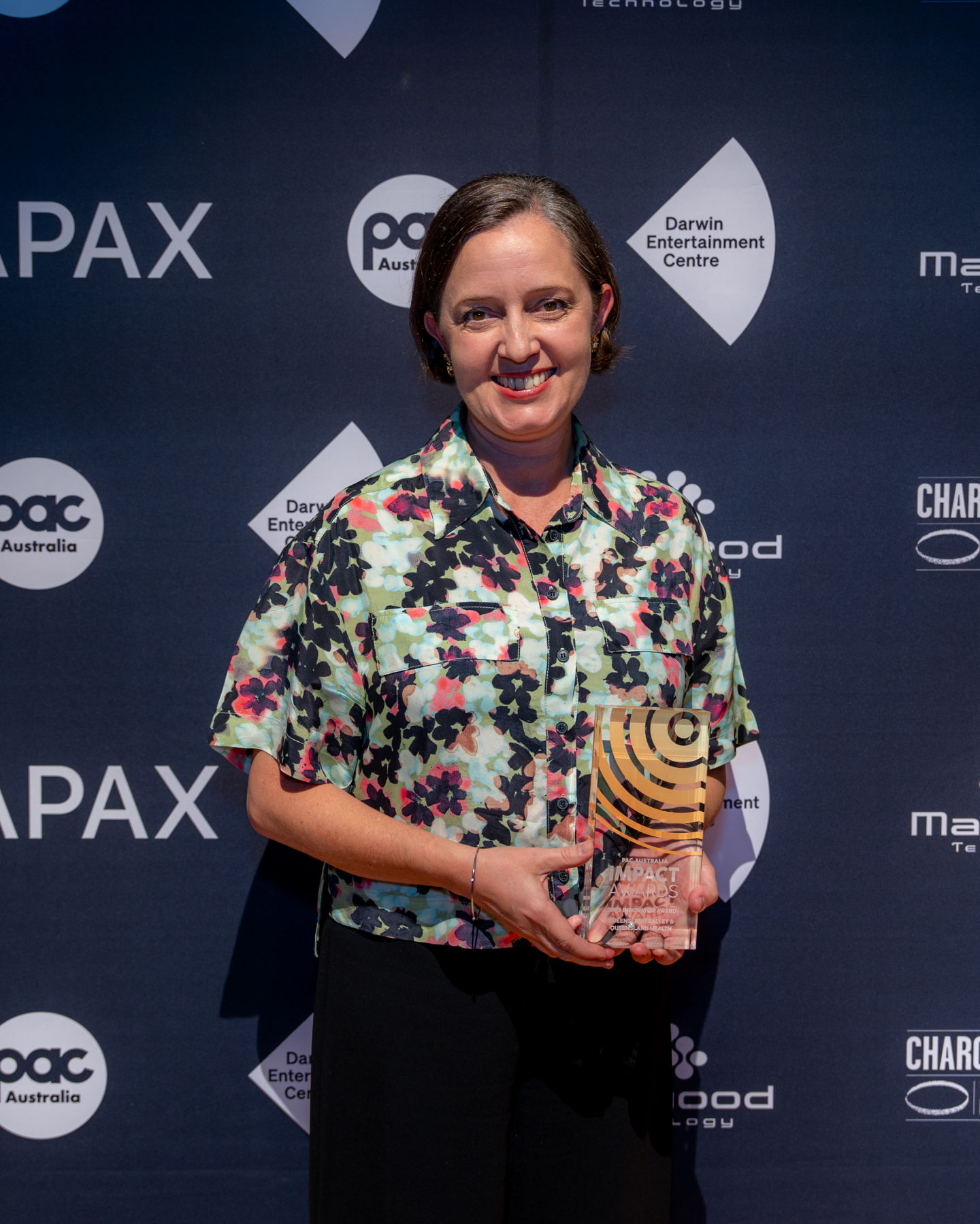 Zara Gomes, Director of Queensland Ballet Community Health Institute accepts the award at the PAC Conference in Darwin. August, 2025.