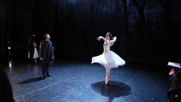 Li Cunxin with Eleanor Thompson on stage at the Empire Theatre in Toowoomba before the curtains goes up on Giselle for the 2013 Regional Tour. Photography David Kelly