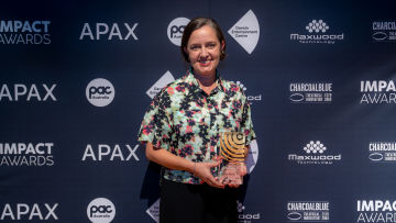 Zara Gomes, Director of Queensland Ballet Community Health Institute accepts the award at the PAC Conference in Darwin. August, 2025.